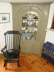 Early 18th century corner cabinet in the Macy-Colby House